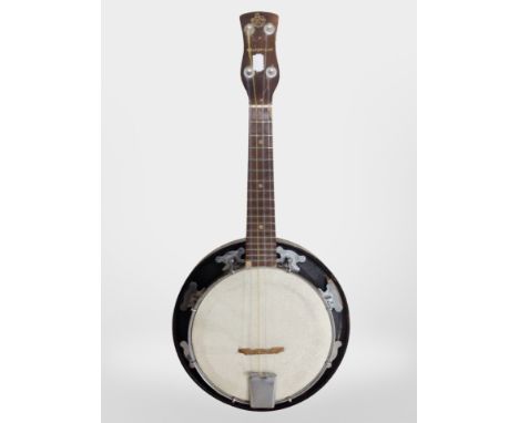 An early 20th century four-string banjo ukelele.