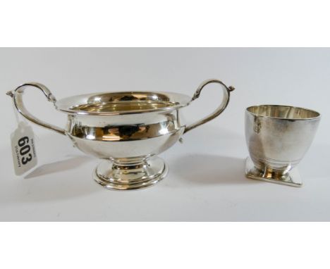 Silver twin handled sugar basin, weight 3 troy ounces approx together with a Christofle plated egg cup in the art deco style.