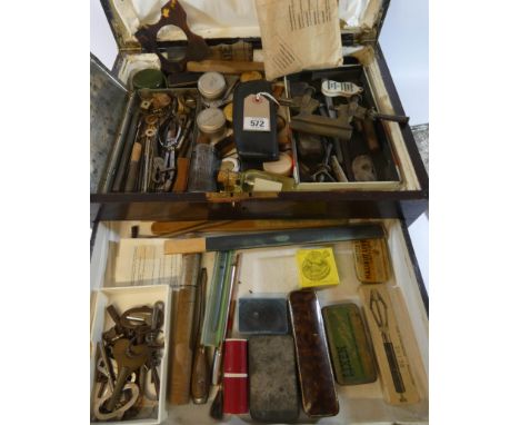 A two tier cutlery cabinet containing a very large lot of watchmakers tools, a very comprehensive lot many hundreds of pieces