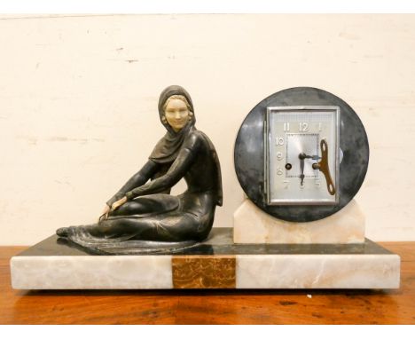 An Art Deco style lady figure mounted marble mantel clock with striking movement 