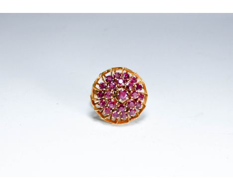 A ladies 14ct yellow gold dress ring set with pink sapphires, ring size Q 1/2, weight approximately 6.6g