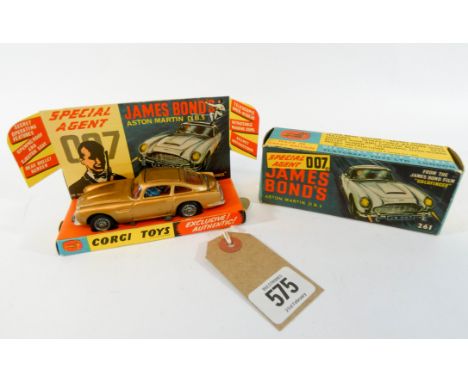 A James Bond Aston Martin DB5 model Corgi toy car in its original box Model number 261 