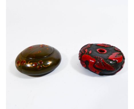Two Japanese Meiji period Manju Netsuke one red lacquer the other circular polished lacquer 