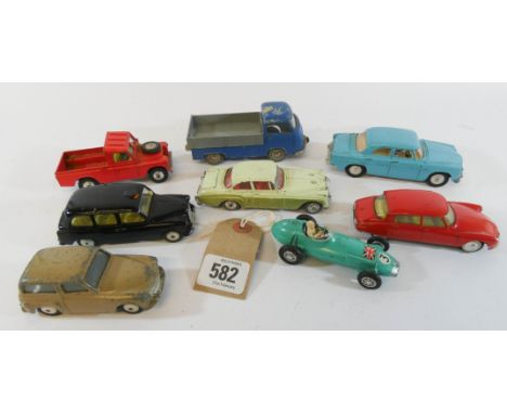 Eight toy cars by Corgi, Spoton and Shuco all in a played with condition 