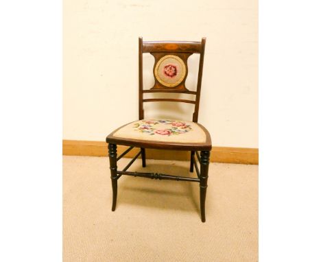 An Edwardian inlaid mahogany bedroom chair with tapestry seat and back panel 