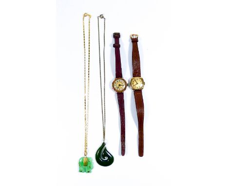 Two vintage ladies 9ct gold cased wristwatches and two jade pendants, one on rolled gold chain.