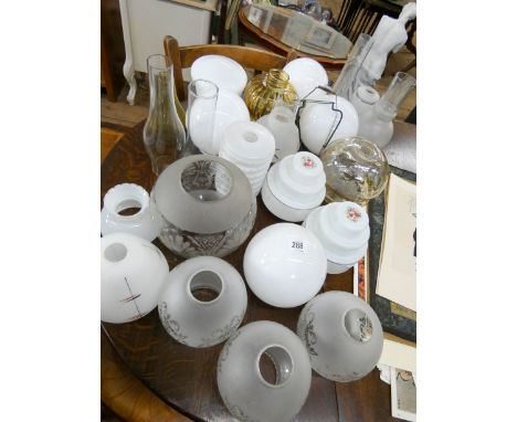 A quantity of assorted glass bowl shaped lamp shades 