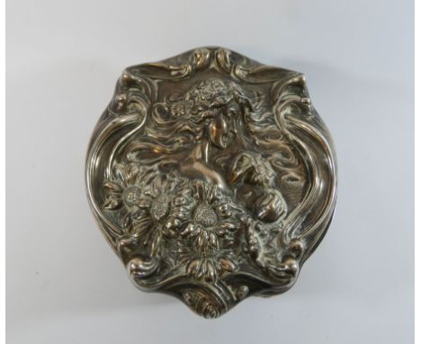 An Art nouveau silver box, by Levi &amp; Salaman, Birmingham 1904, the hinged lid embossed with maidens head amongst sunflowe