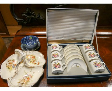 A set of six Royal Worcester bone china floral decorated coffee cups and saucers in fitted case together with Royal Bonn, Ger