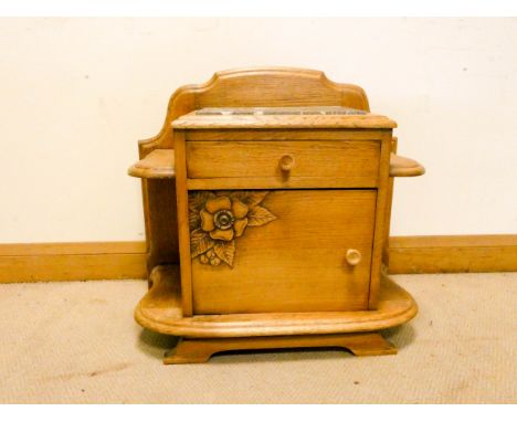 A French light oak bedside cabinet with side shelves and marble top 