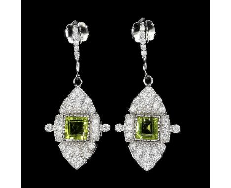 A pair of Art Deco style 925 silver drop earrings set with step cut peridots and white stones, L. 3.2cm.