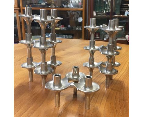 SEVEN MID-20th CENTURY STACKABLE CANDLE HOLDERS BY FRITZ NAGEL FOR BMF each cast metal three-light candle holder designed to 