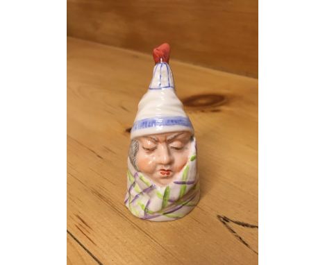 EARLY 20th CENTURY ROYAL WORCESTER PORCELAIN CANDLE SNUFFER, 'MR CAUDLE' with puce mark for 1918, H 8.5 cm . 