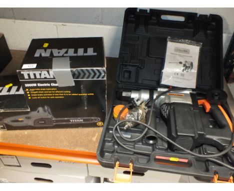 A TITAN 2000W ELECTRIC CHAINSAW TOGETHER WITH A CASED CHALLENGE ROTARY HAMMER DRILL