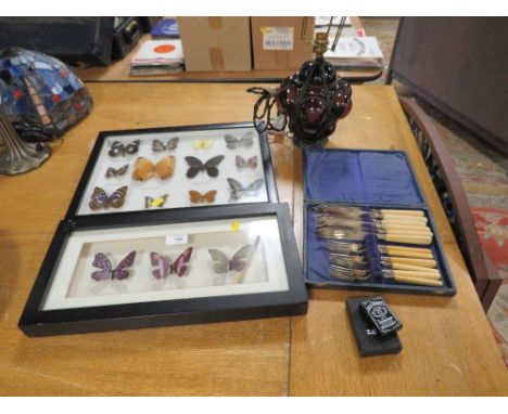 AN UNUSUAL GLASS AND WIREWORK LAMP WITH REPRODUCTION BUTTERFLY DISPLAYS, FLATWARE, LIGHTERS ETC