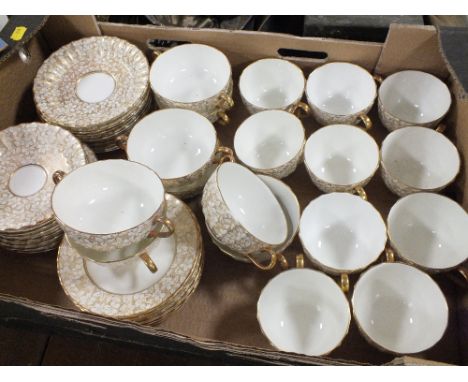 TWO TRAYS OF ROYAL WORCESTER FLORAL GILDED CHINA TO INCLUDE DINING PLATES, TRIOS ETC.