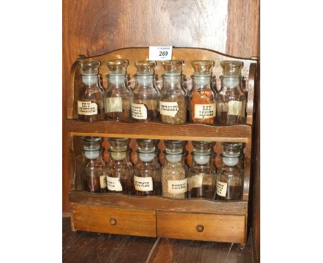 A VINTAGE WOODEN SPICE RACK