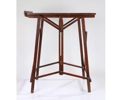 Edwardian oak metamorphic table, the hinged table a reading/music stand converting to the table top, the underside with the l