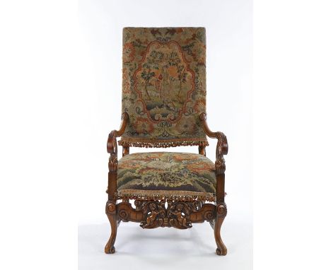 17th Century style walnut and tapestry armchair, with a high tapestry back with a figural scene above a stuff over seat with 