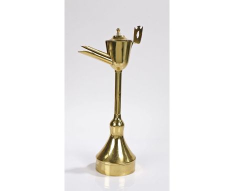 19th Century brass whale oil lamp, the high oil lamp above the tall stem, and conical base, 43cm high