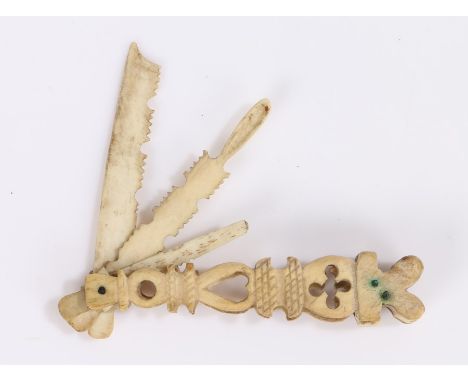 19th Sailors Scrimshaw bone tool, with a handle decorated with hearts and shapes with three implements folding outwards with 