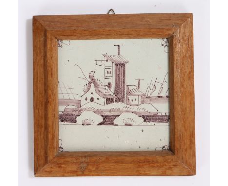 18th Century Delft tile, manganese of a tower and building, housed within an oak frame, 16.5cm diameter including the frame  