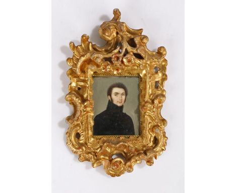 Late 18th Century portrait miniature, of a gentleman in a black jacket, housed within a Rococo gilt gesso frame, 10.5cm x 17c