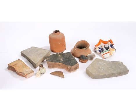 Collection of pottery shards and finds, to include medieval floor tile section, Tang Sung Dynasty finial, Staffordshire secti