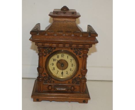 unusual Carved wooden mantle clock, good condition