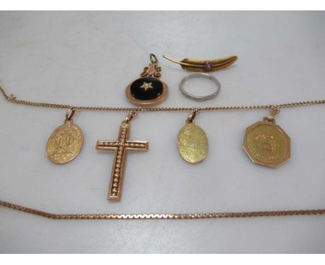 four pendants tested as 18ct gold attached to a base metal chain, together with an onyx pendant tested as 18ct gold, gross we