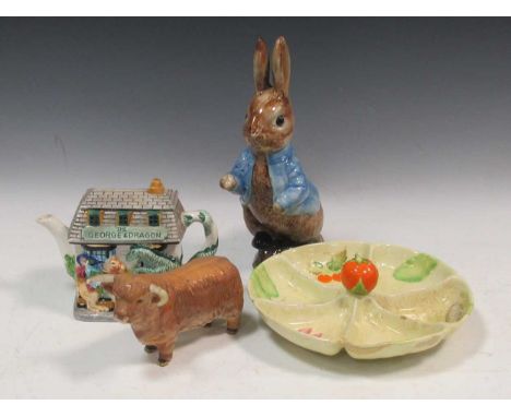 Large Sylvac Peter Rabbit figure, a Carltonware dish, a Bewswick model of a bull, and a novelty teapot