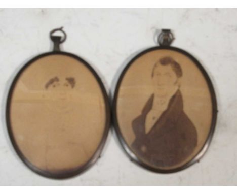 A pair of portrait miniatures of a man and a woman, watercolour on paper, 7.5 x 6cm (2)