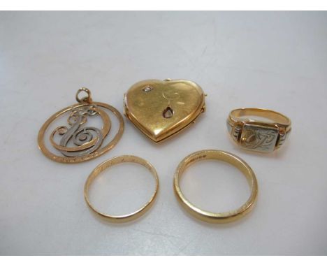 A heart shaped locket tested as 18ct gold, a signet ring tested as 18ct gold, a wedding ring tested as 18ct gold, a wedding r
