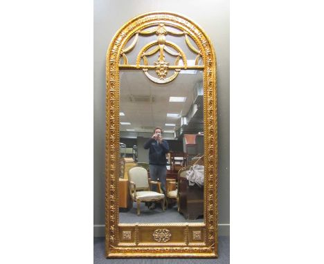 A large gilt wall mirror with arch top, 270 x 121 cm 