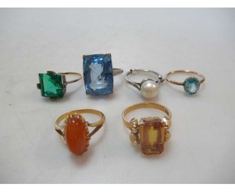 A group of gemset rings, a synthetic spinel ring, tested as platinum, a pearl ring, tested as platinum, gross weight 14.5g, a