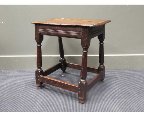A late 17th Century oak joint stool, 51cm high 50cm wide