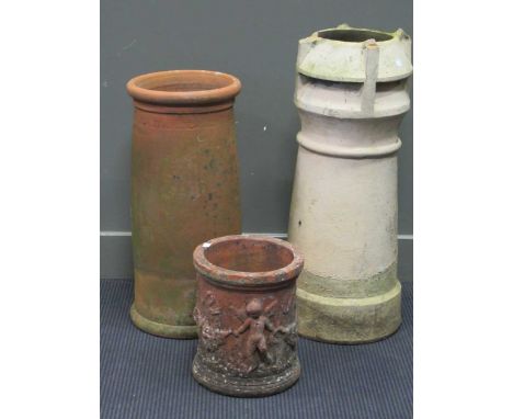 An Italian terracotta planter of cylindrical form decorated in relief with dancing putti holding a garland, together with two