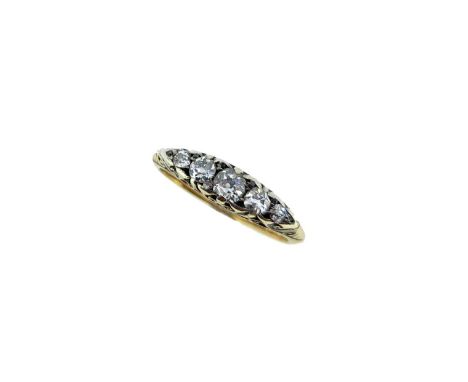 A diamond carved head half hoop ring, unhallmarked, stamped '18CT', settings tested as silver, weight 3.6gCondition report: O