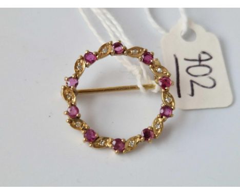 A Circular Ruby And Diamond Brooch, 9Ct, 2.8 G.