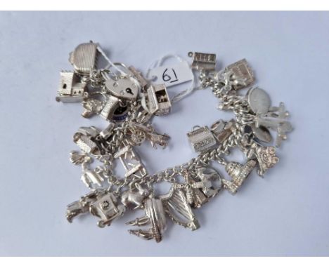 A Heavy Vintage Silver Charm Bracelet 104G With Multiple Silver Charms