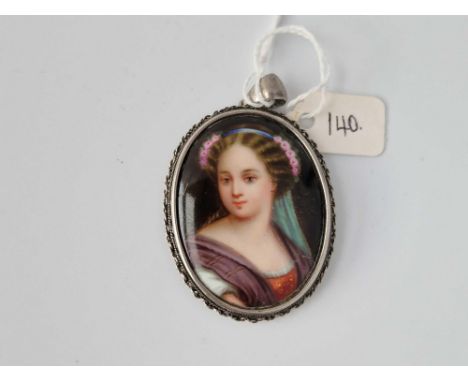 A Silver Portrait Brooch Of A Young Woman