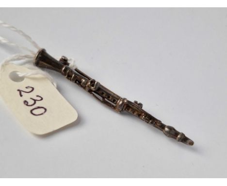 A Novelty Bar Brooch In The Form Of A Clarinet