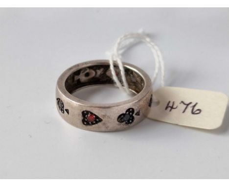 A Silver Card Suit Style Ring With Garnets And Sapphires Size V