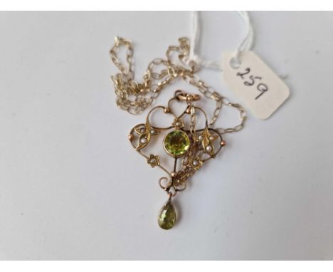 A Art Nouveau Peridot And Pearl Pendant And Chain 9Ct 18 Inch