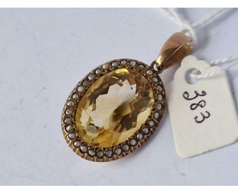 A Citrine And Pearl Pendant 9Ct 5 Gms
