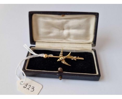 A Gold And Pearl Bird Bar Brooch