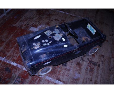 A vintage mid-century tin plate and metal pedal car, shipping  unavailable 
