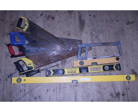 A selection of spirit levels and other tools 