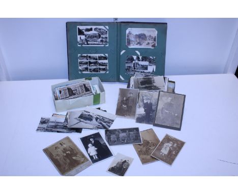 A good quantity of antique and vintage postcards including a good selection of humourous/saucy examples 