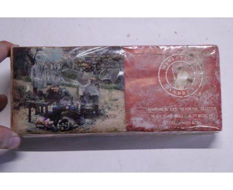 A sealed Andrea miniatures model 1:32 scale 'Off Duty' 